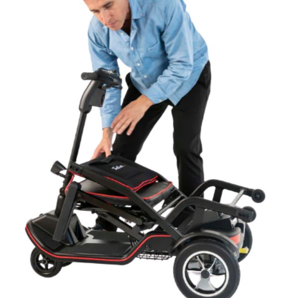 Man folding up the Feather Lightweight Electric Scooter