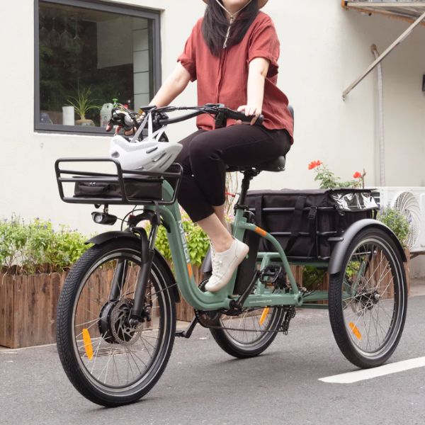 A Woman Riding the Blazer Full Suspension with a Basket on the Back, Showcasing the Step Thru Frame Design