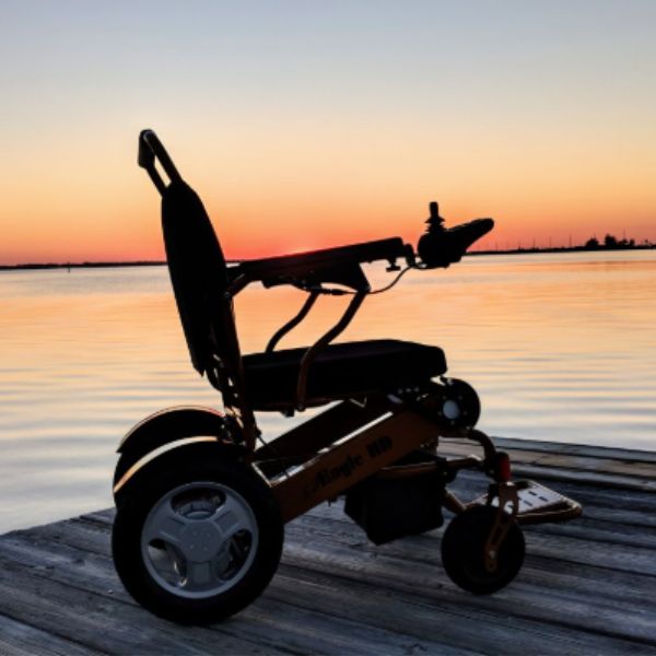 Electra 7 HD Wide Bariatric Folding Power Wheelchair Beside Sea Shore