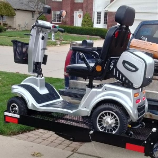 Gladiator 4 Wheel Heavy Duty Mobility Scooter on a Lift