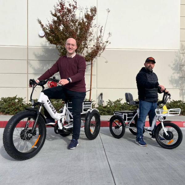 Two men Riding on the GoBike Forza and Trio Electric Tricycle