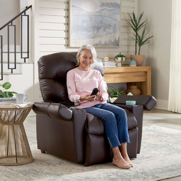 Golden Technologies Cloud+ MaxiComfort PR511 Lift Chair with aa Woman using the Remote Control