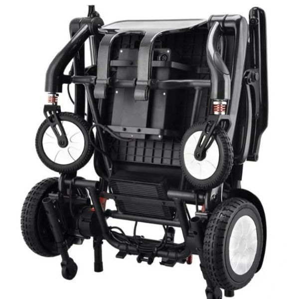 Matrix Ultra Carbon Fiber Electric Wheelchair in Black Folded