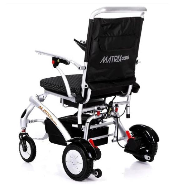 Matrix Ultra Carbon Fiber Electric Wheelchair in Silver Rear View
