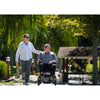 Pride Jazzy Ultra Light Folding Power Wheelchair Front  View with Rider