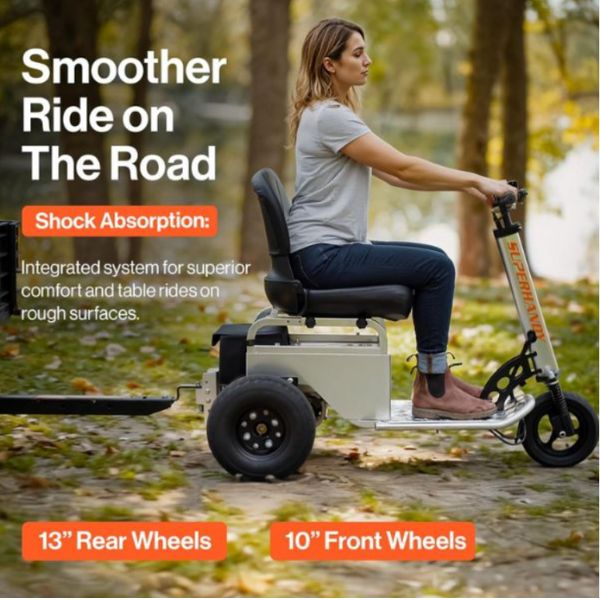 Person riding a SuperHandy Electric Tugger Tow Tractor Car And Riding Scooter with text highlighting features like shock absorption and wheel sizes in a natural setting.