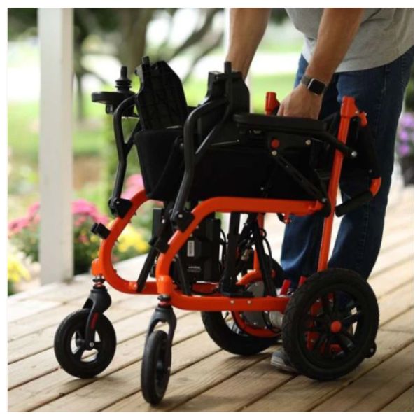 Superhandy GoRide Folding Electric Wheelchair Being Folded by a Man