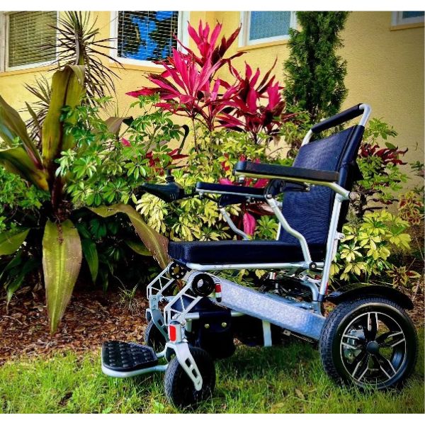 Tech 4 Remote Control Folding Power Wheelchair on the Grass