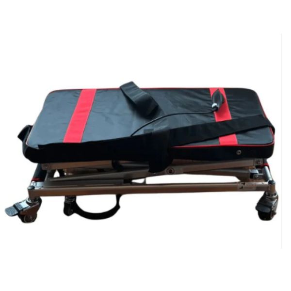 Black and red bag on a metal stand with wheels on a white background