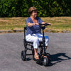 Lady riding the eFoldi Lite Ultra Lightweight Mobility Scooter 