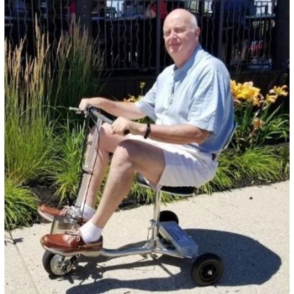 HandyScoot Folding 3 Wheel Travel Mobility Scooter Side View with Customer Review